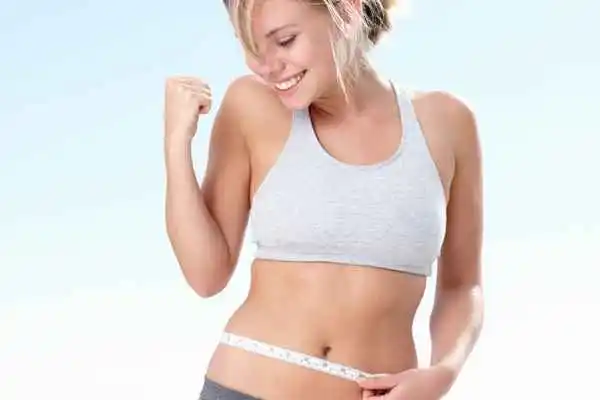 woman happy after fat reduction treatment Lancashire