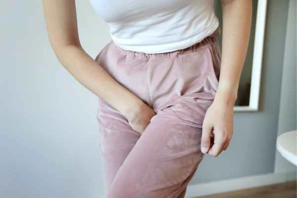 older woman running to the toilet because of urinary incontinence Lancashire